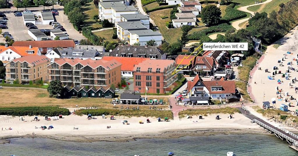 an aerial view of a beach and buildings at Meeresblick "Seepferdchen" Haus 3 WE 42 in Hohwacht