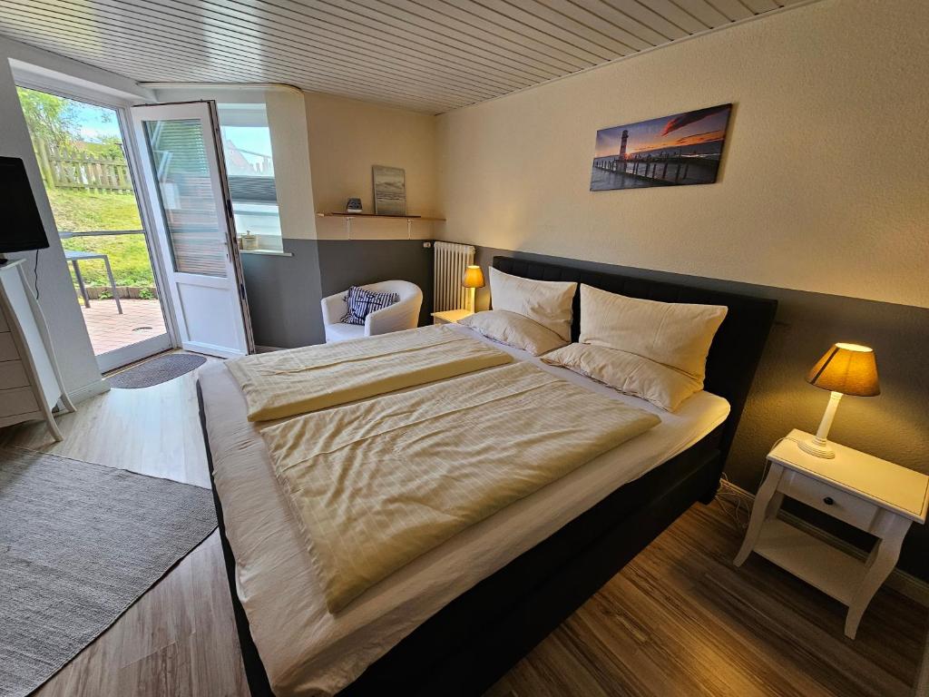 Llit o llits en una habitació de Vineta Koje