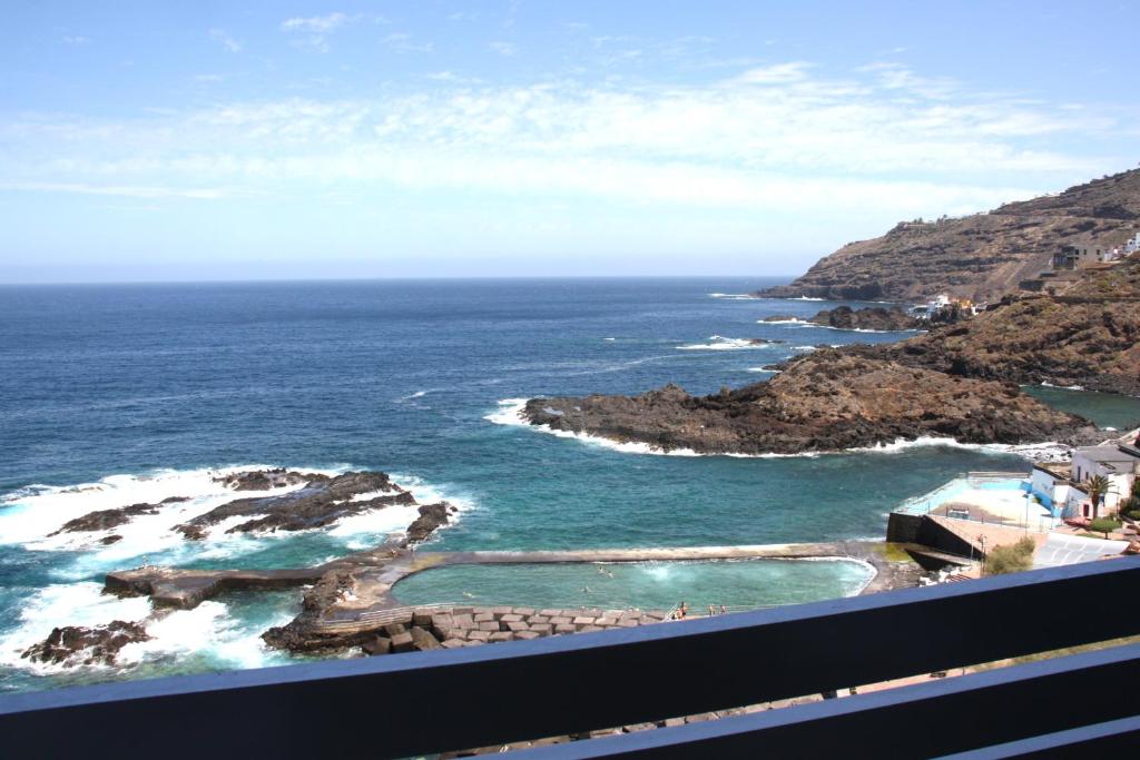 a view of the ocean from a balcony at APTO 1103 MESA DEL MAR in Puerto de la Madera