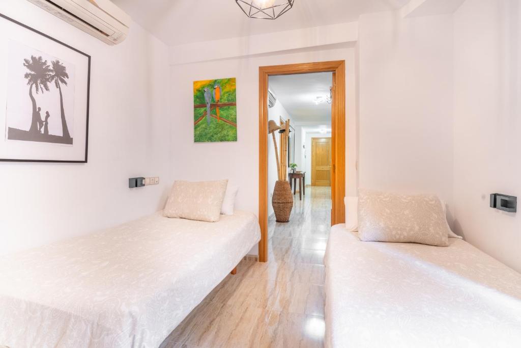 Postel nebo postele na pokoji v ubytování Villa Oasis
