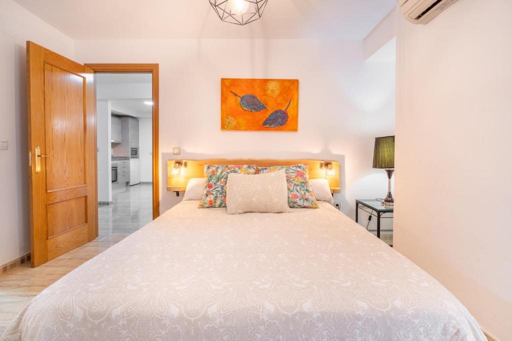 Postel nebo postele na pokoji v ubytování Villa Oasis