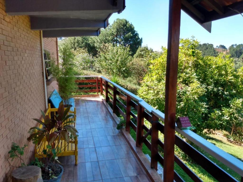 Uma varanda ou terraço em Acomodação Flor Liz