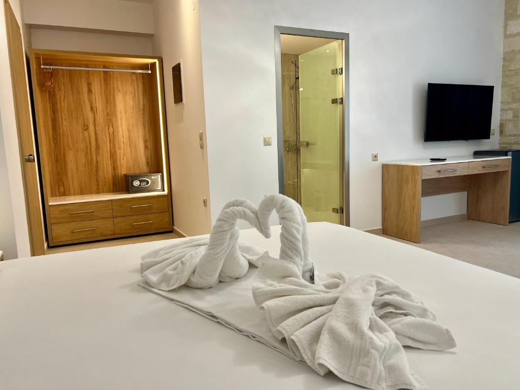 Postel nebo postele na pokoji v ubytování Lili Hotel