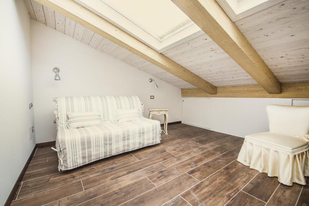Postel nebo postele na pokoji v ubytování Le Stanze Di Leonardo