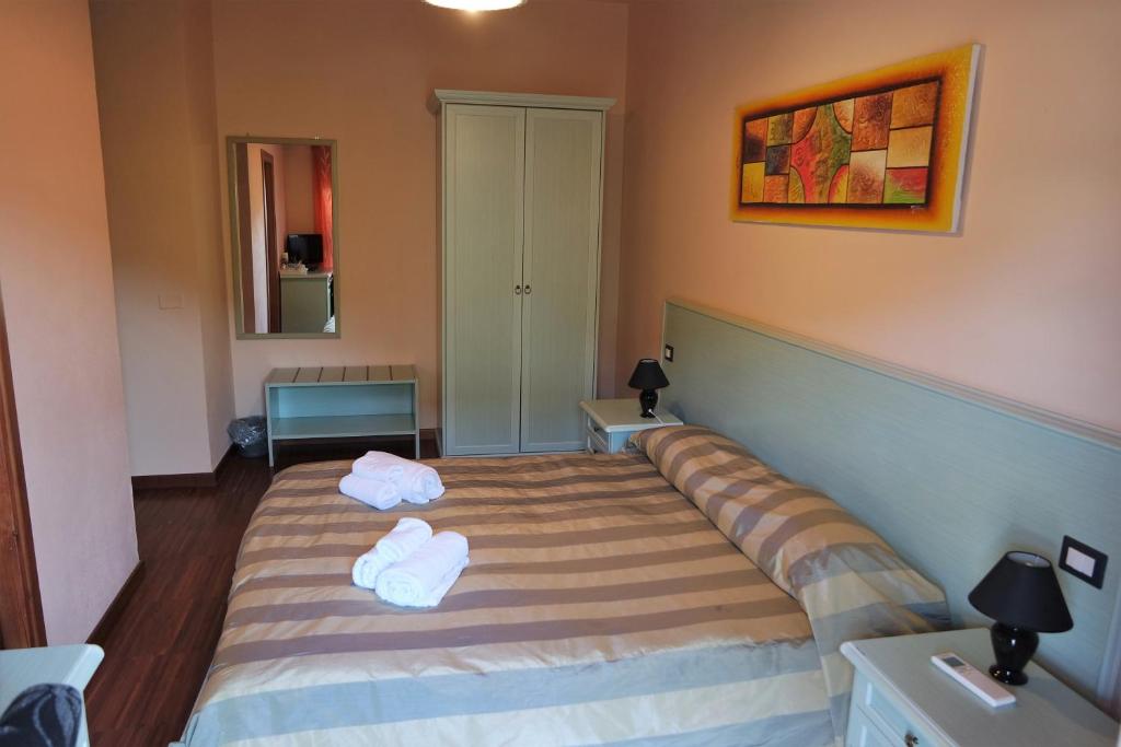 Posteľ alebo postele v izbe v ubytovaní Bosa Guest House