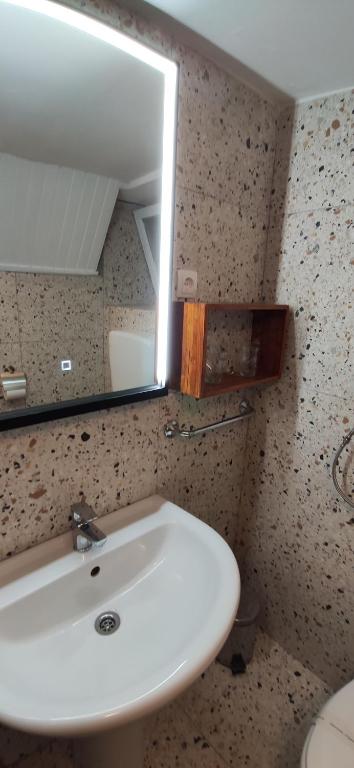 Koupelna v ubytování Studio Apartment Nihar