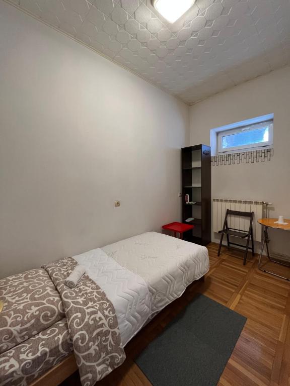 Postel nebo postele na pokoji v ubytování Rooms Asceric