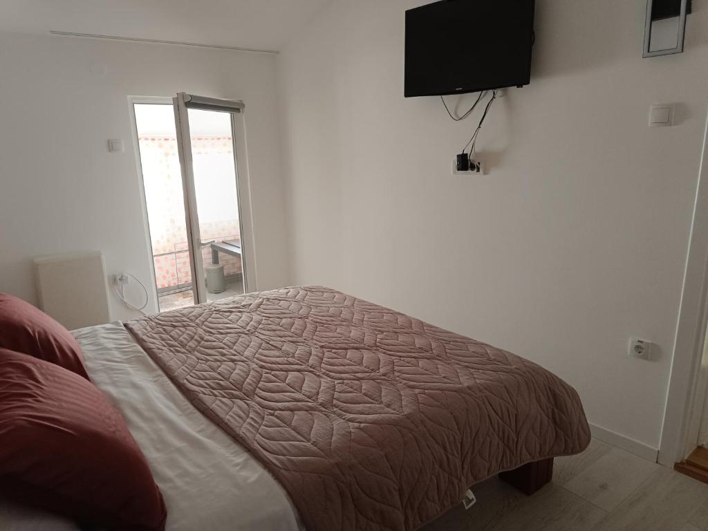 Postel nebo postele na pokoji v ubytování Zemun Central