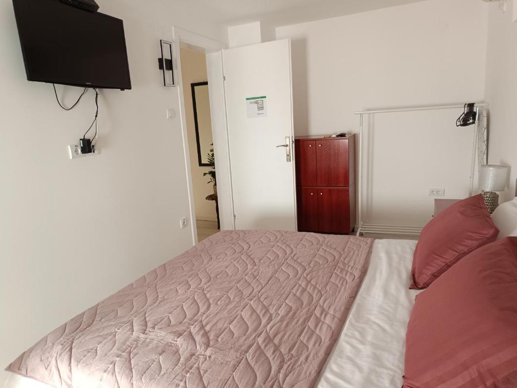 Postel nebo postele na pokoji v ubytování Zemun Central