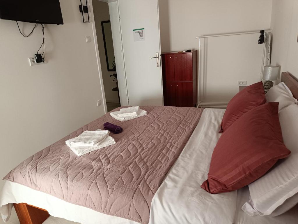 Postel nebo postele na pokoji v ubytování Zemun Central