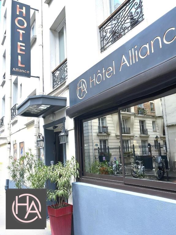 a hotel alliance sign in front of a building at Alliance Hôtel Paris in Paris