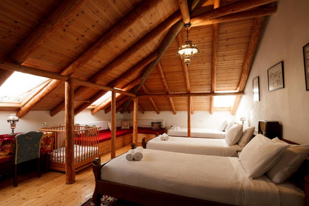Postel nebo postele na pokoji v ubytování Boutique Hotel Musée