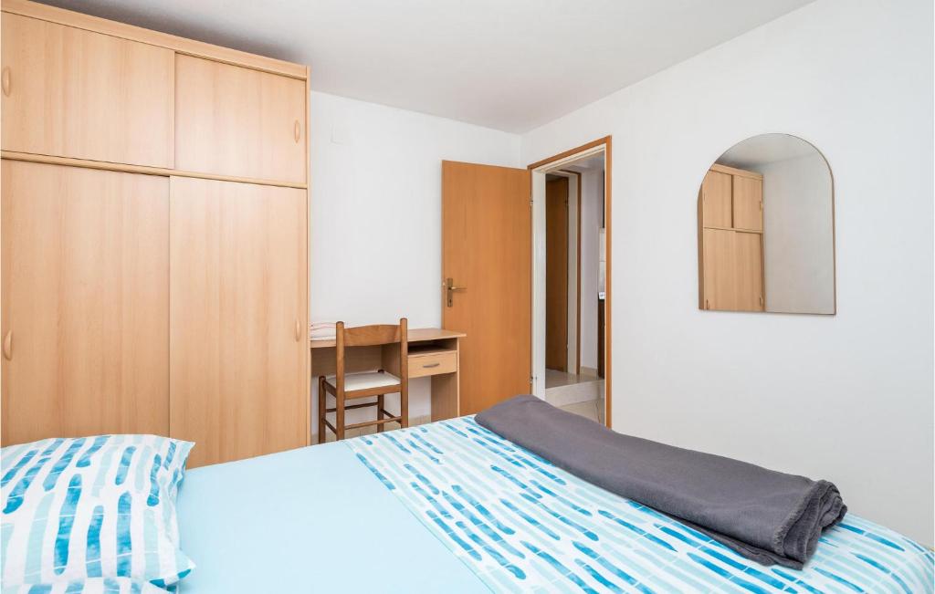 Postel nebo postele na pokoji v ubytování Beach Front Apartment In Punta Kriza
