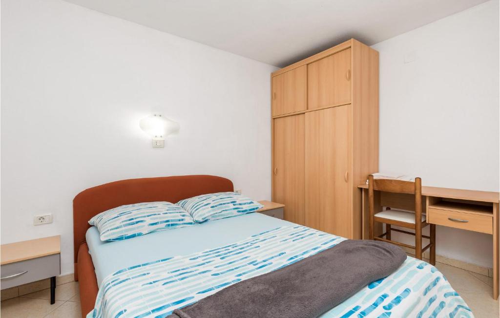 Postel nebo postele na pokoji v ubytování Beach Front Apartment In Punta Kriza