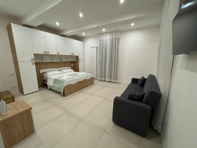 Postel nebo postele na pokoji v ubytování B&B La Coccinella