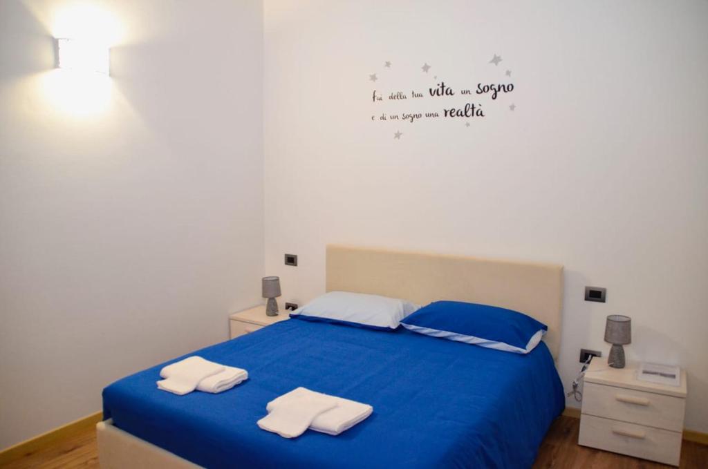 Postel nebo postele na pokoji v ubytování La Caigola