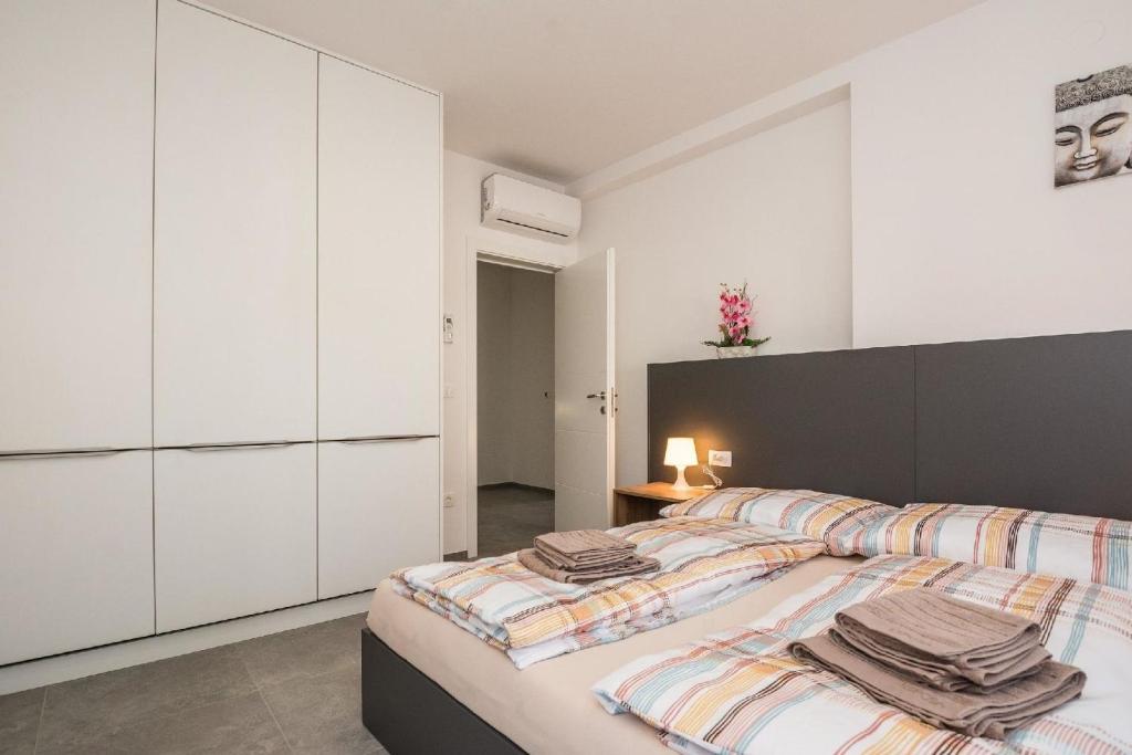 Posteľ alebo postele v izbe v ubytovaní Apartment Spanic 2