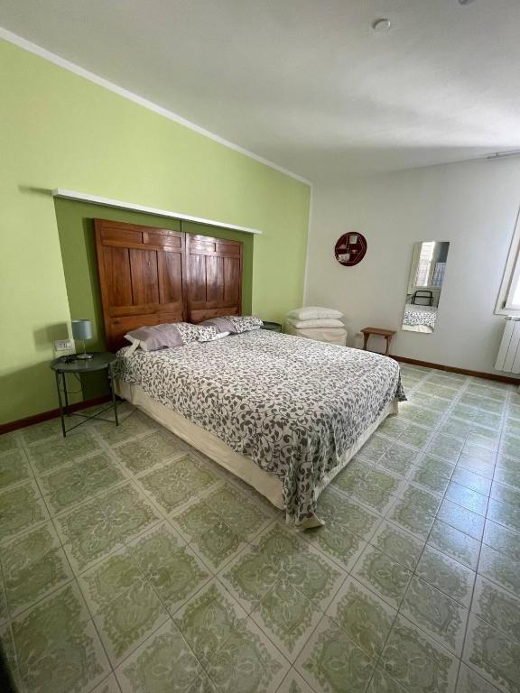 Postel nebo postele na pokoji v ubytování Lo Scrigno