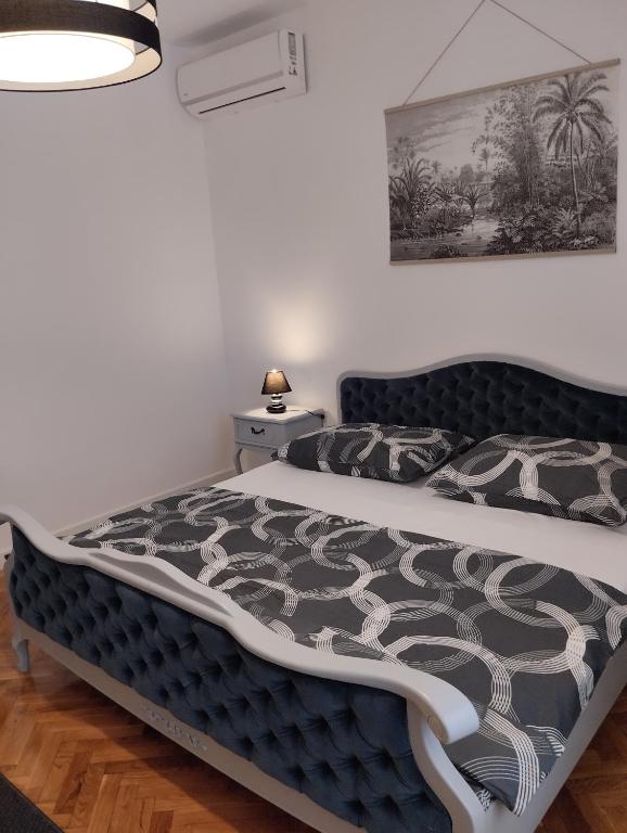 Postel nebo postele na pokoji v ubytování Keti House