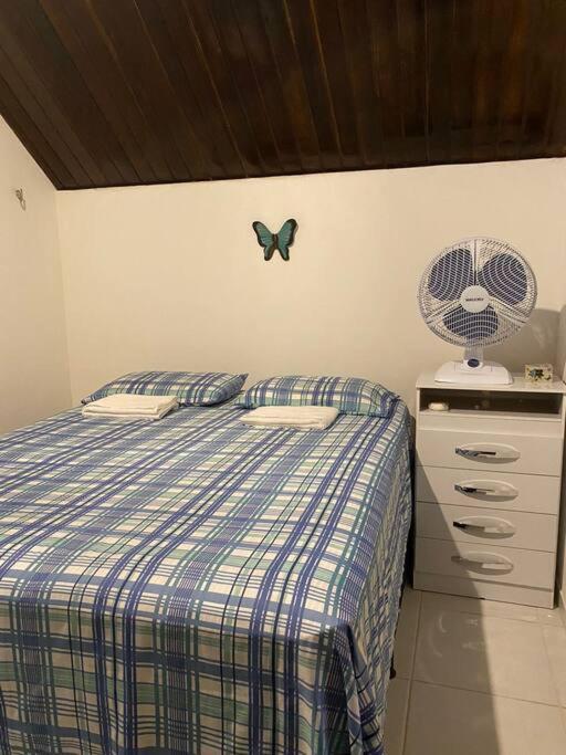 Postel nebo postele na pokoji v ubytování Chalé Encantador em Bananeiras