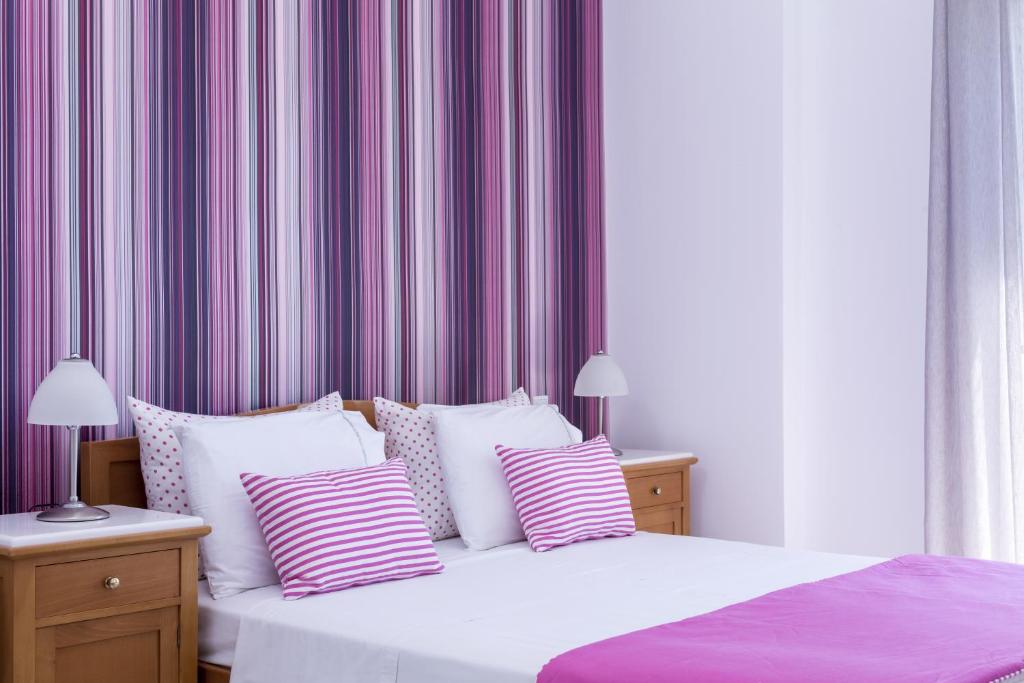 Postel nebo postele na pokoji v ubytování Santellini Hotel