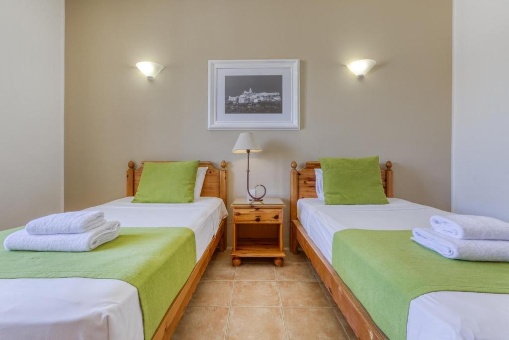 Voodi või voodid majutusasutuse Ta Frenc Apartments toas