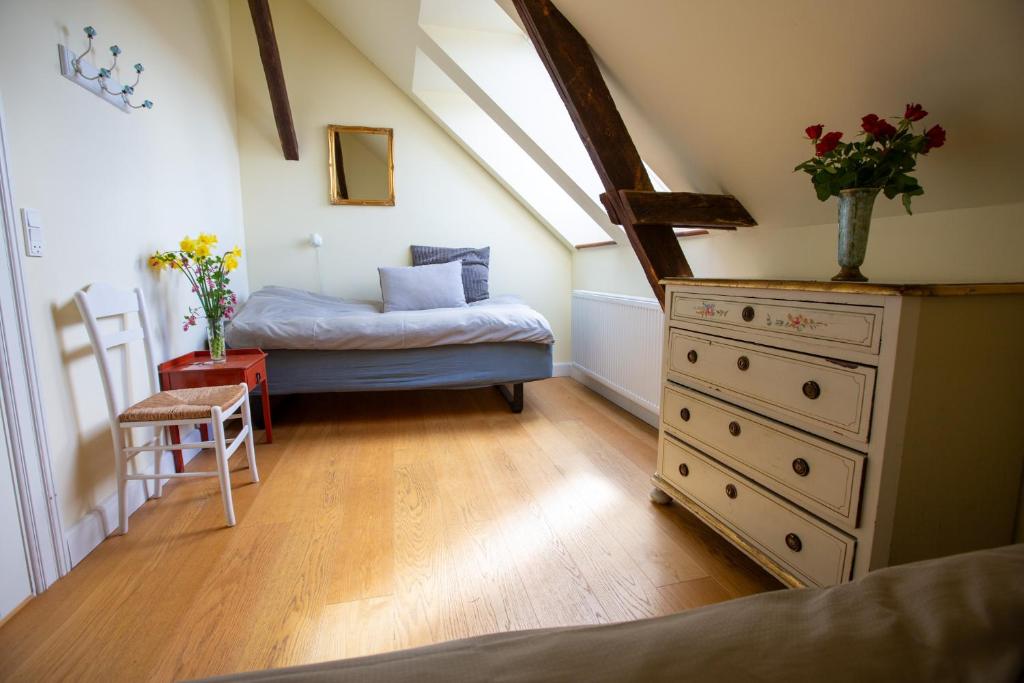 Postel nebo postele na pokoji v ubytování AvalonBnB