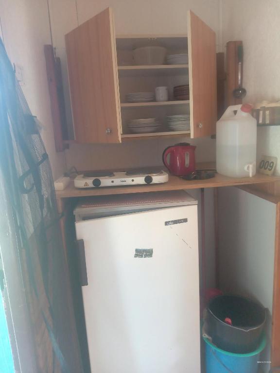 Kuchyň nebo kuchyňský kout v ubytování Chatka číslo 9