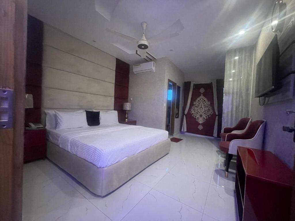 Postel nebo postele na pokoji v ubytování Hotel Croydon Int