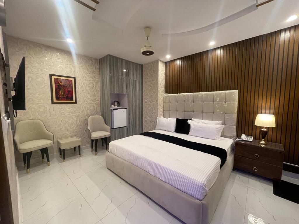 Postel nebo postele na pokoji v ubytování Hotel Croydon Int