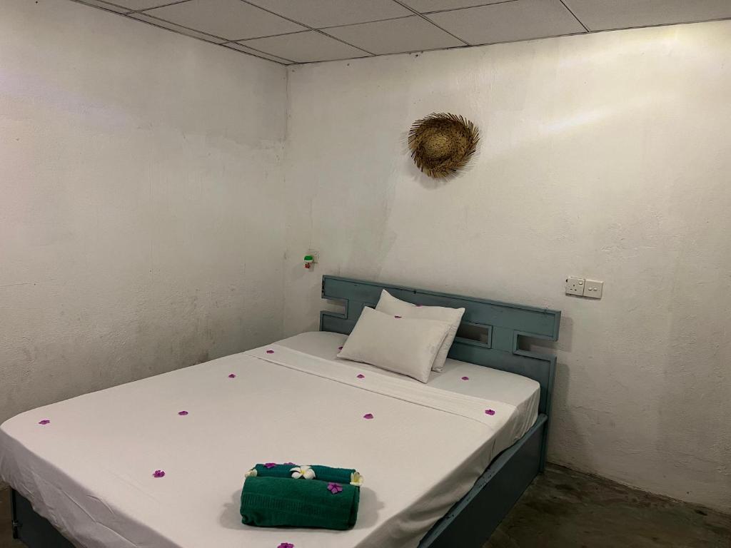 Postel nebo postele na pokoji v ubytování Cactus Arugambay