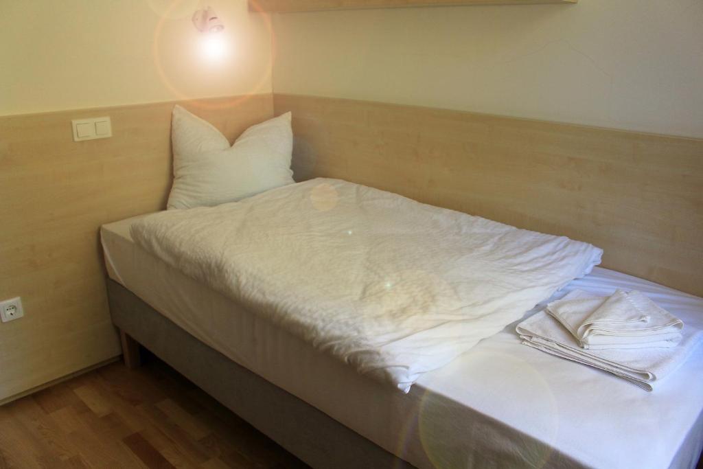 Posteľ alebo postele v izbe v ubytovaní Szentkút Pilgrim Center
