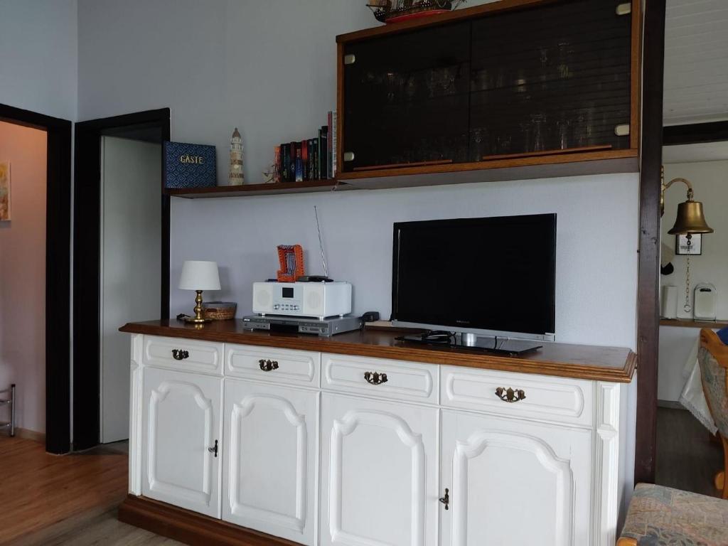Kuchyň nebo kuchyňský kout v ubytování Schönes Familien und Hunde-freundliches Ferienhaus in Strandnähe, sehr ruhige zentrale Lage