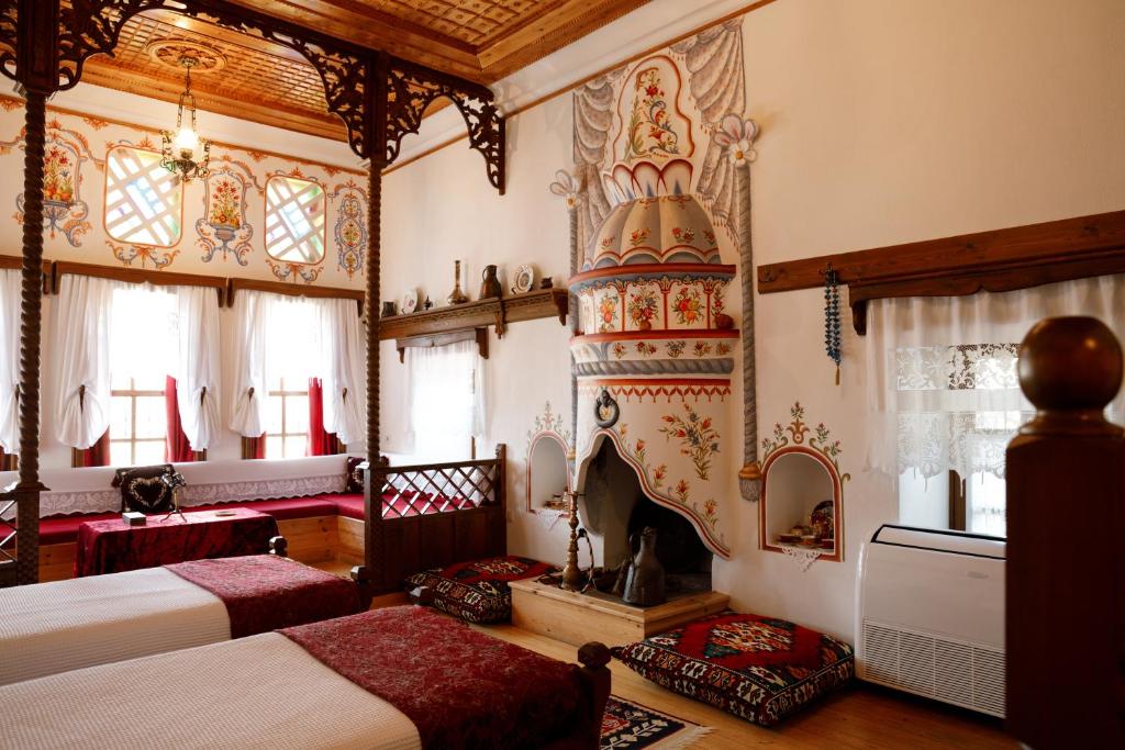 Postel nebo postele na pokoji v ubytování Boutique Hotel Musée