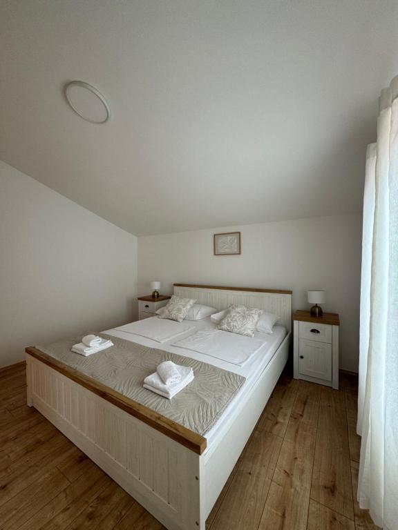 Postel nebo postele na pokoji v ubytování Apartman Patricia