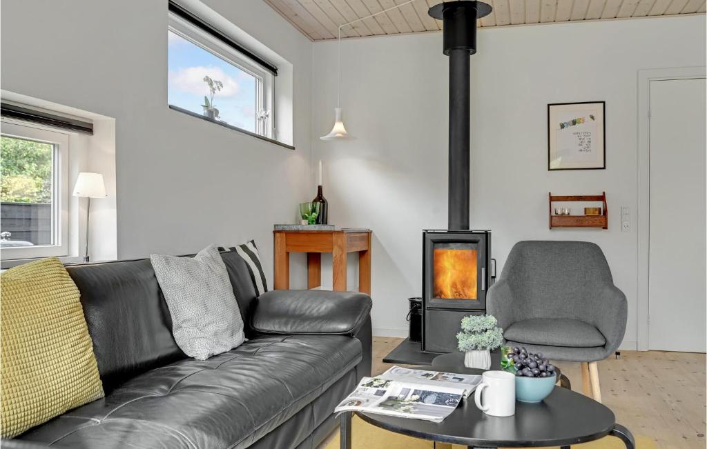 Posezení v ubytování Holiday Home Ebeltoft With Fireplace Xi