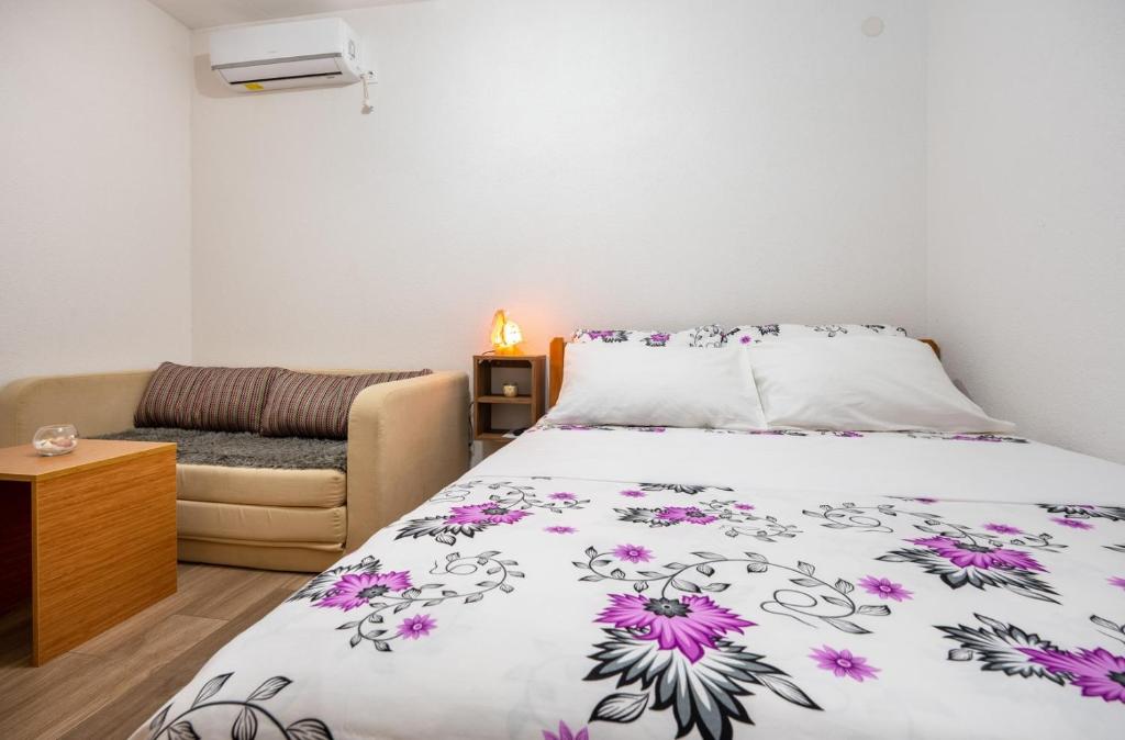 Postel nebo postele na pokoji v ubytování Guest House Ardiana