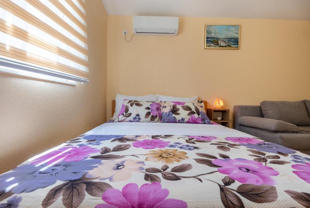 Postel nebo postele na pokoji v ubytování Guest House Ardiana