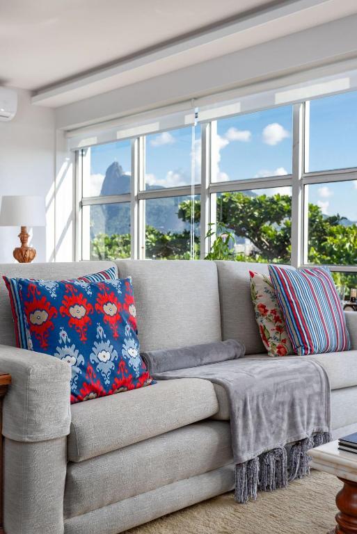 Гостиная зона в Apartamento vista mar e vista pão de açúcar
