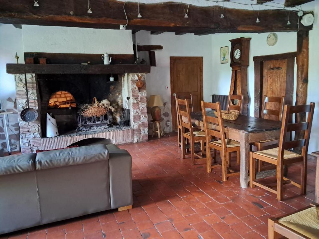 Posezení v ubytování la maison du sabotier
