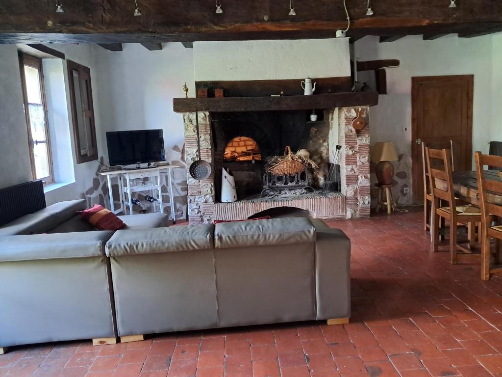 Posezení v ubytování la maison du sabotier