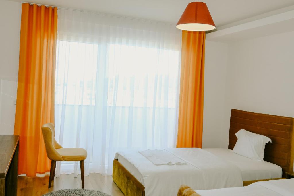 Postel nebo postele na pokoji v ubytování Andoena Resort