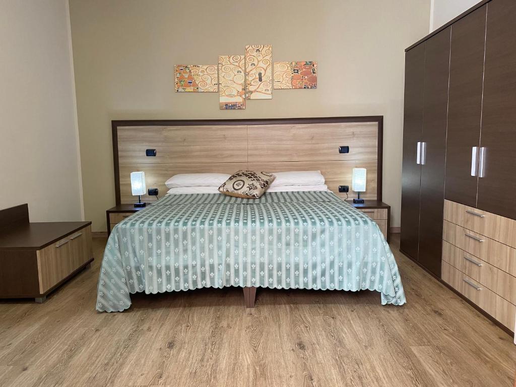 Postel nebo postele na pokoji v ubytování B&B Duomo Pizzo ApartHotel