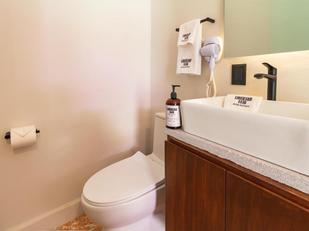 Koupelna v ubytování Hotel Libertad 1416