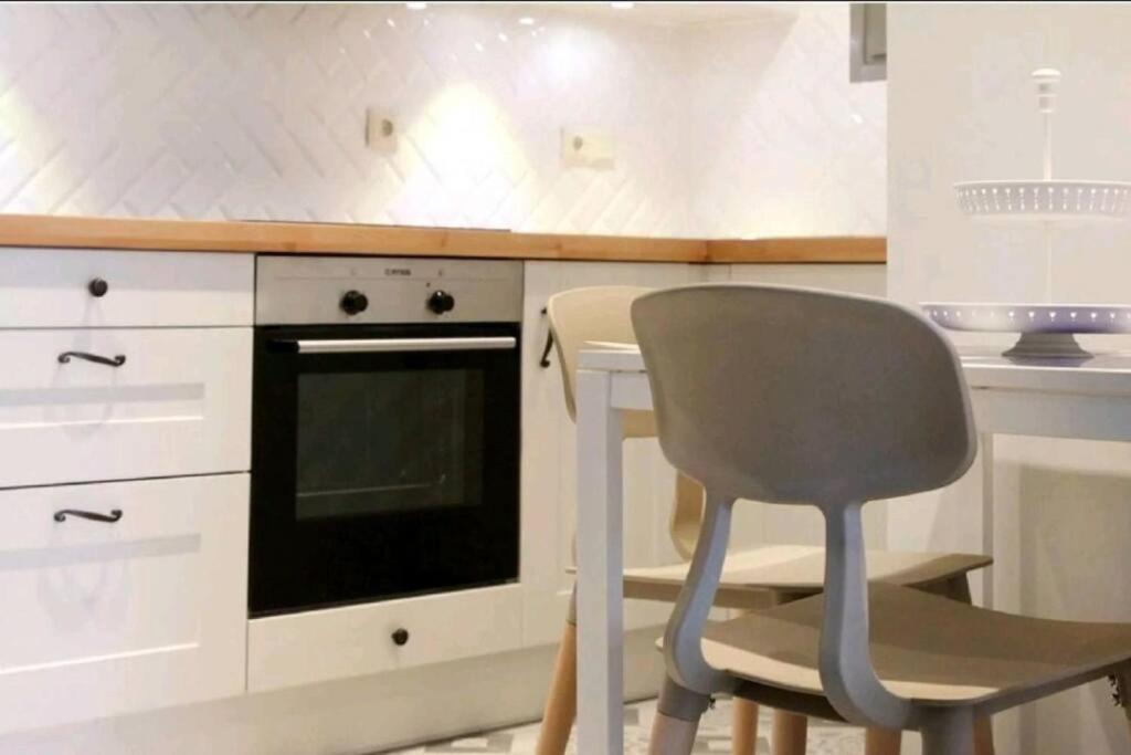 Kuchyňa alebo kuchynka v ubytovaní Stylish apartment in Acropolis