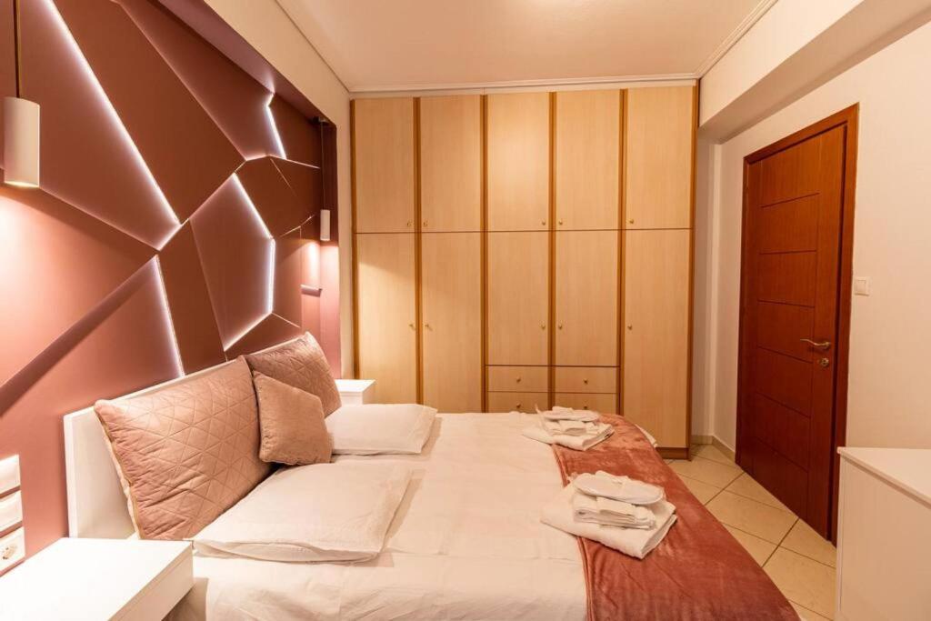 Posteľ alebo postele v izbe v ubytovaní Armonia Rentals Volos Flat
