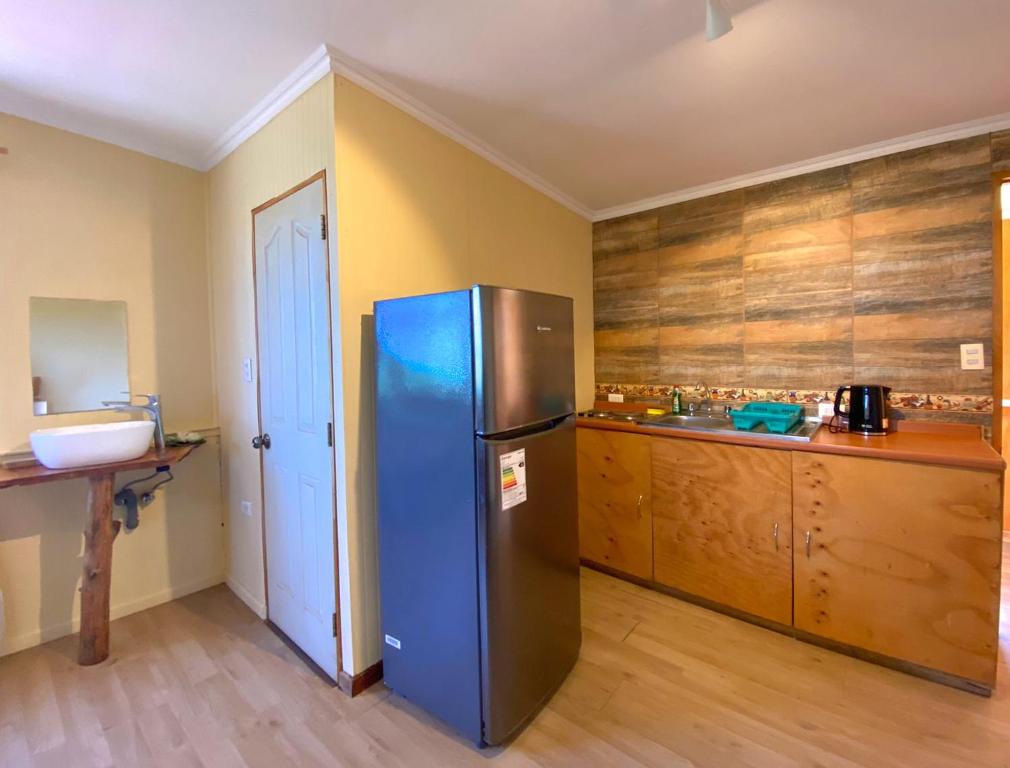 Una cocina o cocineta en Hotel Uka Mana