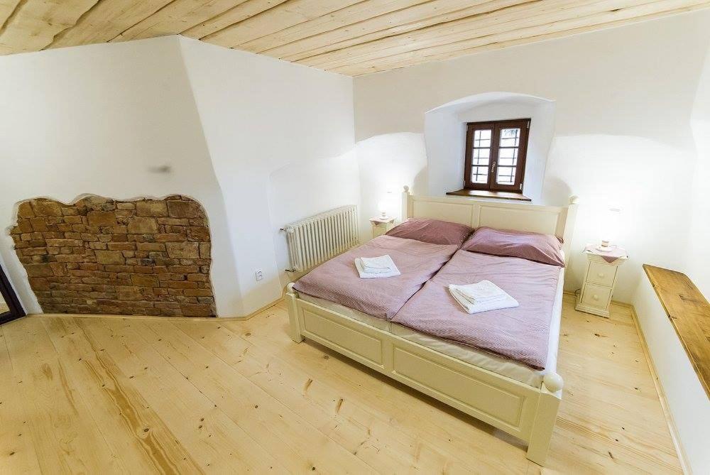 Postel nebo postele na pokoji v ubytování Penzion u Františka