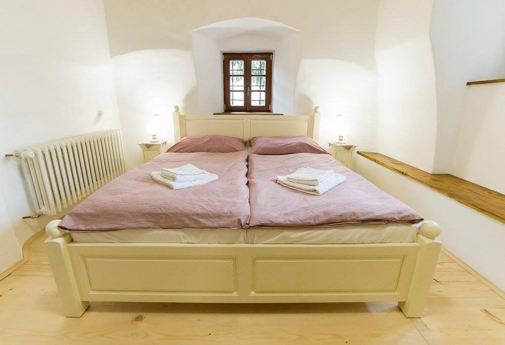 Postel nebo postele na pokoji v ubytování Penzion u Františka