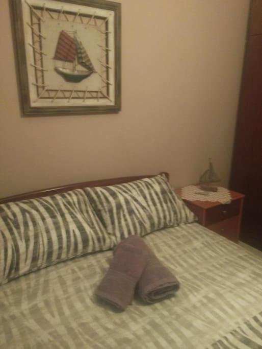 Postel nebo postele na pokoji v ubytování zoi apartment